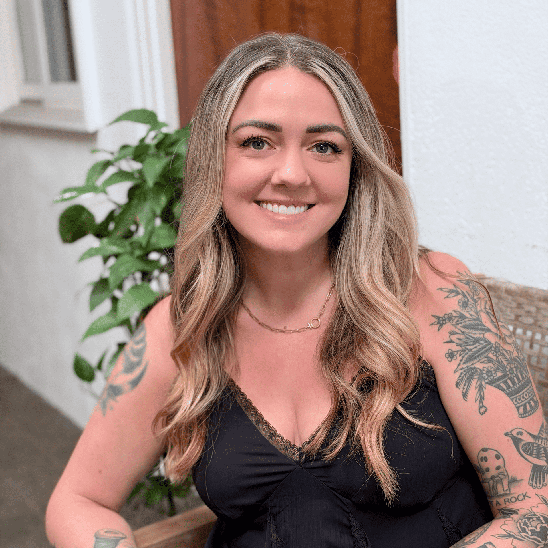 Portrait of Katelyn Kleinschmidt, a professional stylist at Salon Bamboo, showcasing their expertise and style.