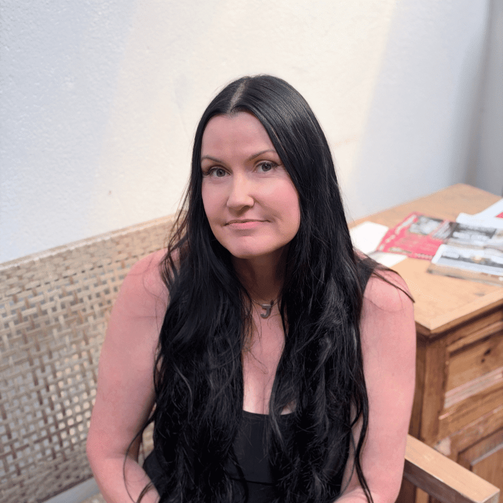 Portrait of Jackie Marcucci, a professional stylist at Salon Bamboo, showcasing their expertise and style.