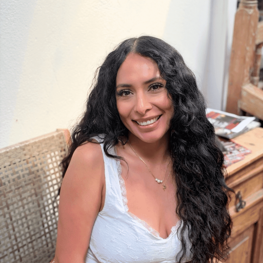 Portrait of Valeria Fuentes, a professional stylist at Salon Bamboo, showcasing their expertise and style.