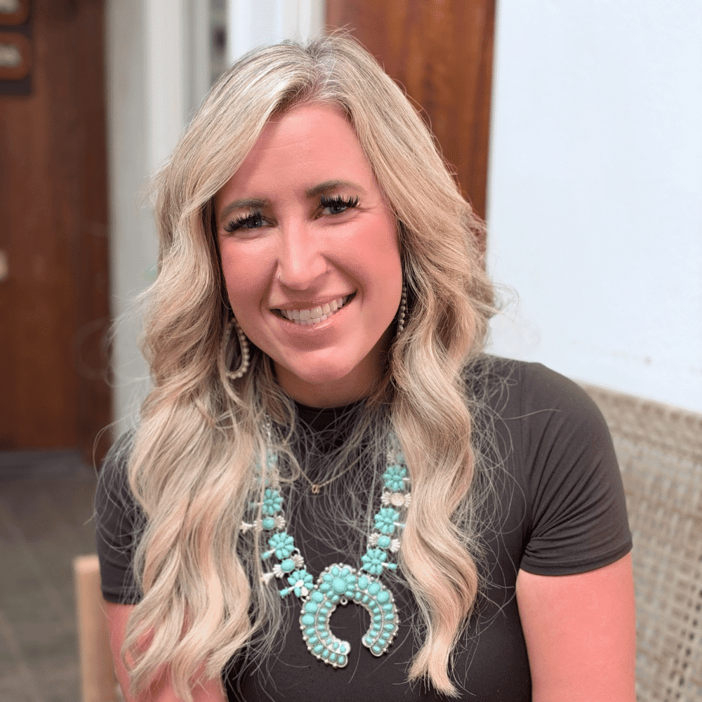 Portrait of Abbey Mead, a professional stylist at Salon Bamboo, showcasing their expertise and style.